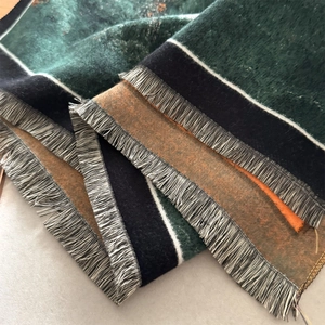 Thick vintage landscape style scarf with fringe edges in deep dark green and orange