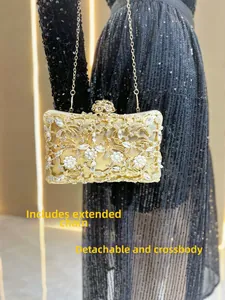 Detail of gold crystal evening bag with floral metalwork and detachable chain strap