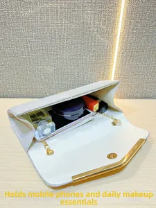 Spacious silver pleated evening clutch interior fits phone and makeup essentials