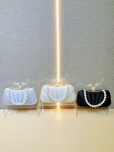 Elegant pleated satin evening clutch bags with pearl handle in light blue, white and black