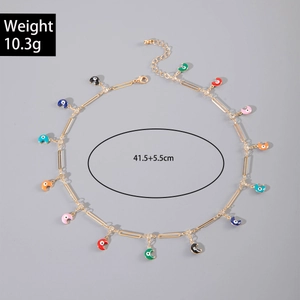 Detail of colorful Evil Eye crescent fringe necklace with gold chain and dimensions