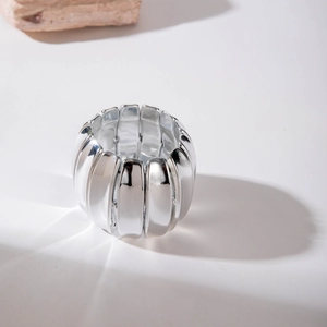 Minimalist silver wide spiral segmental bracelet with a polished mirror finish