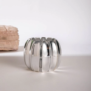 Silver chunky spiral textured segmented bangle with industrial metallic finish for women