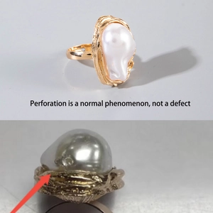 Vintage baroque pearl ring set with gold plating and floral accents in a split view