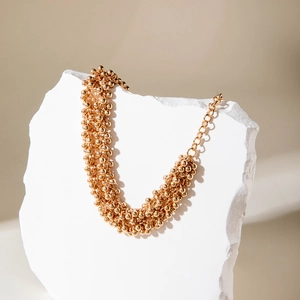 Fashionable golden double-layer beaded necklace with geometric beads and chunky chain
