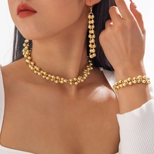 Chunky gold bead jewelry set with layered necklace, bracelet and earrings for women