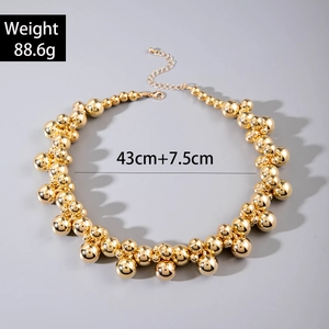 Polished gold beaded collar necklace with adjustable lobster clasp, length 43cm plus 7.5cm