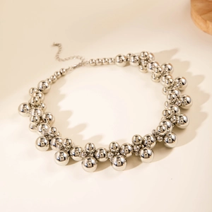 Detail of silver spherical cluster necklace with adjustable lobster clasp chain