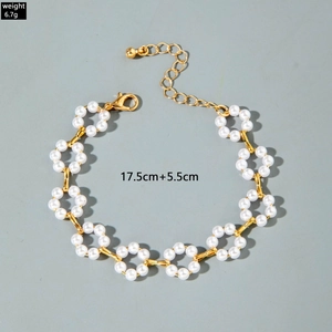Detail view of pearl floral necklace with dimensions weight 6.7g and adjustable lobster clasp