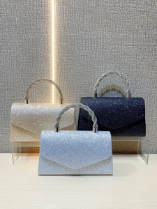 Sparkling evening clutch bags with rhinestone knot handles in gold and silver