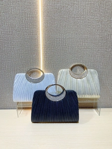 Pleated leather evening bags with rhinestone ring handles in blue, gold and black