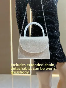 Detail of silver rhinestone evening bag with detachable metal chain for crossbody use