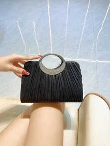 Elegant black pleated evening clutch bag with sparkling rhinestone circular metal handle