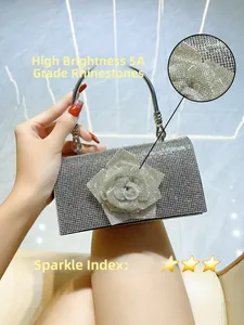Detail of silver evening bag with 5A grade rhinestones and 3D rose decoration