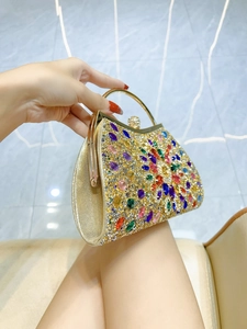 Luxurious evening clutch bag with multicolored crystals and gold handle for formal events