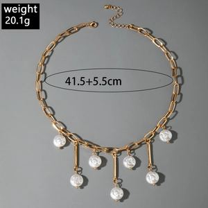 Detail of chunky gold chain necklace with white faux pearls and size dimensions