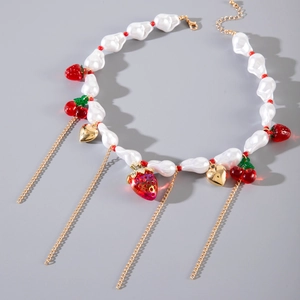Collana di perle barocche con pendenti a fragola ciliegia rossi e nappe a cuore oro