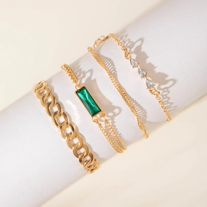 4-piece vintage gold bracelet set with emerald green square stone and cuban links