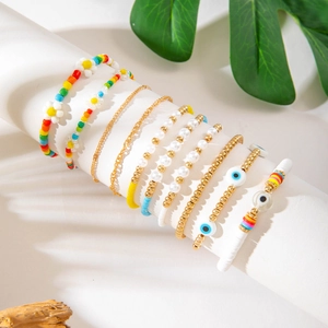 Bohemian colorful bead bracelet set with evil eye and daisy floral charms for women