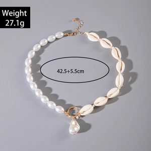 Baroque pearl shell necklace with irregular pendant and golden ring for summer beach wear