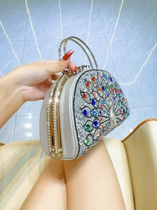 Peacock crystal evening clutch bag with colorful rhinestones and semi-circular metal handle