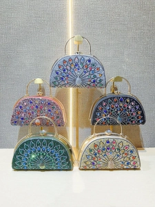 Peacock crystal evening clutch bags in five colors with round metal handles and rhinestones