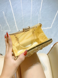Sparkling gold rhinestone evening clutch bag with chain strap and satin lining