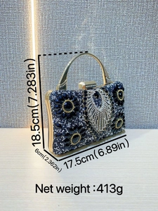 Blue sequin evening clutch bag with black gemstone flower design and metal handle