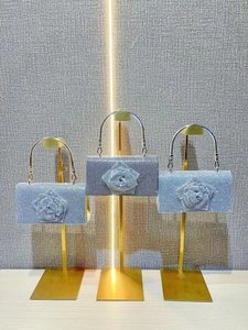 Sparkling rhinestone evening bags with crystal rose decoration and metal ring handles