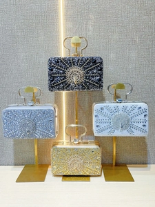 Elegant rhinestone evening clutch bag with peacock feather pattern and crystal top handle