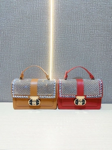 Elegant rhinestone-studded handbags in brown and red leather with stylish metal twist locks