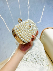 Handmade pearl evening clutch bag with rhinestone flower and gold metal frame