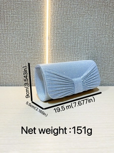 Elegant pleated silver-blue glitter clutch bag with bow design and metal chain strap