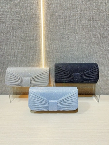 Pleated glitter evening clutch bag with bow design in silver, navy and light blue colors