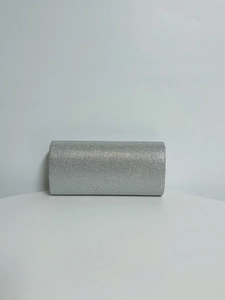 Front view of a silver glitter clutch bag with rectangular shape and rounded corners