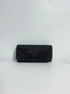 Detailed view of the pleated black glitter evening clutch with elegant fan-shaped texture