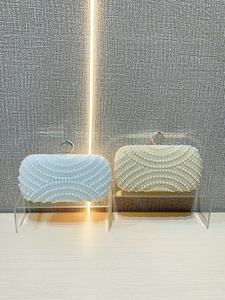 Elegant white and gold pearl evening clutch bag with sparkling rhinestone ring clasp