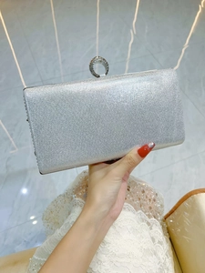 Sparkling silver glitter hard shell evening clutch bag with luxury diamond ring closure