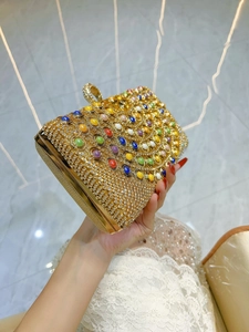 Luxury rhinestone evening clutch with colorful gemstones and ring clasp closure