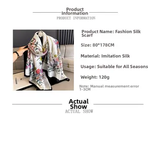 Detail of floral print faux silk scarf showing 80x178cm dimensions and soft texture