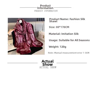 Detail view of burgundy paisley faux silk beach scarf with dimensions and material specs