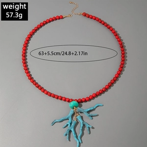Détails du collier de perles rouges avec pendentif corail, montrant poids et taille