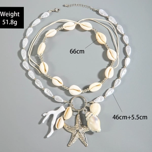 Detail view of bohemian shell necklace with starfish pendant and dimension labels