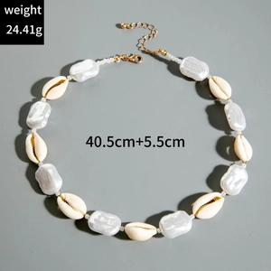 Detail view of handmade shell and pearl necklace with 40.5cm chain and 24.41g weight