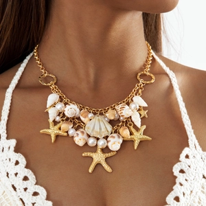Bohemian seashell necklace set with gold starfish and pearls for beach vacation style