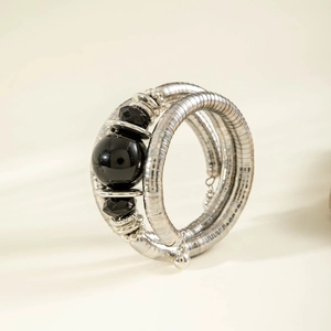 Retro multi-layer snake wrap bracelet featuring silver metal coils and black polished beads