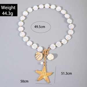 Bohemian shell necklace detail with starfish pendant, pearls and size measurements