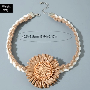 Detail of woven sunflower pendant necklace with weight and length measurements