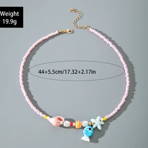 Detailed shot of handmade colorful beaded ocean necklace with starfish and shell pendants