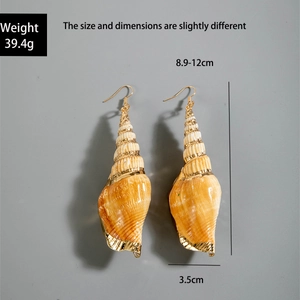 Detail view of natural spiral seashell earrings with gold hooks and size measurements